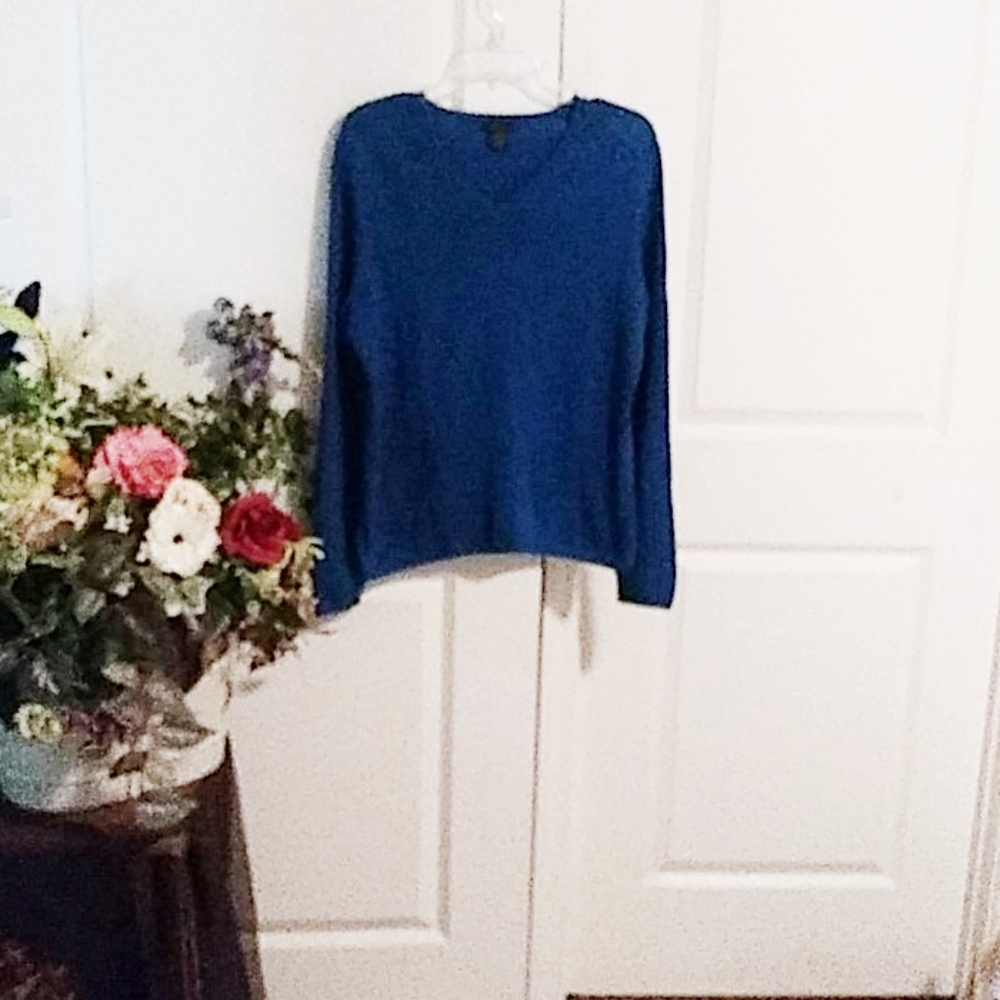 Only mine blue cashmere sweater. (56)